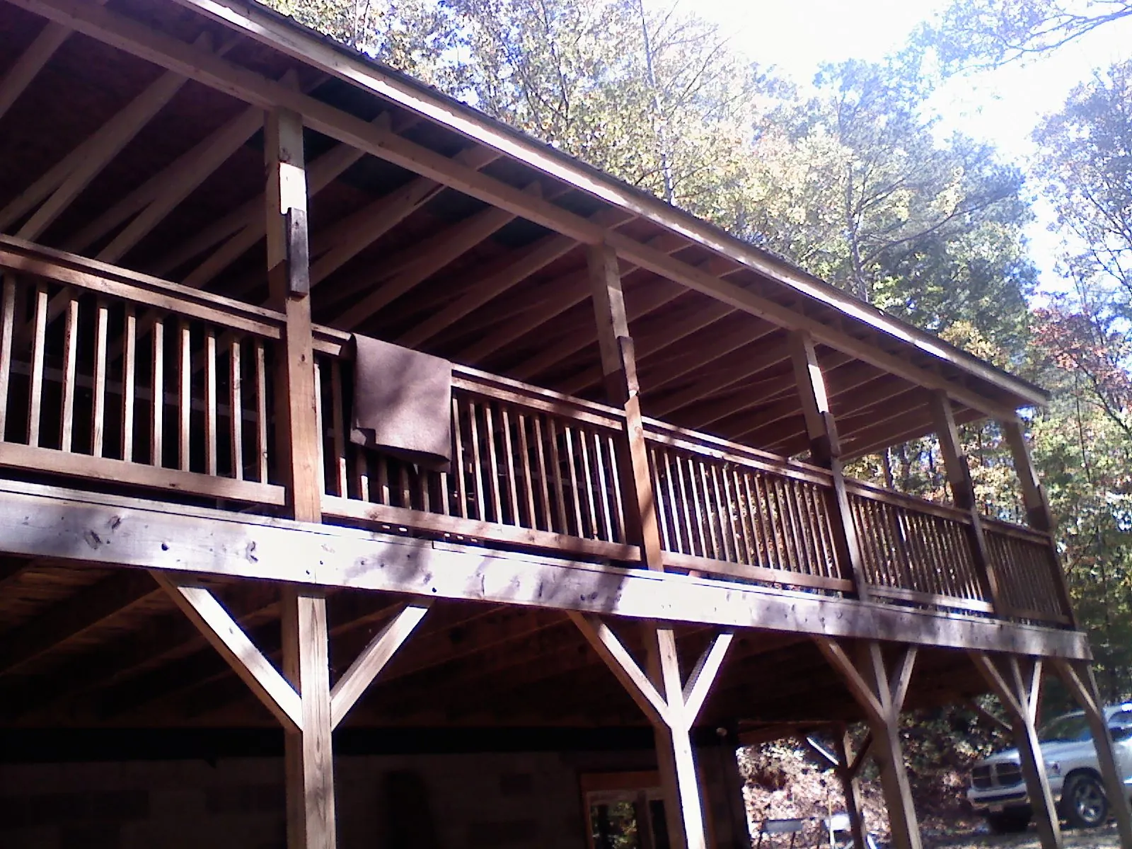 Timber framing under a new elevated porch and deck — Roof Leak Repair in Hickory Valley by Roofing Brothers